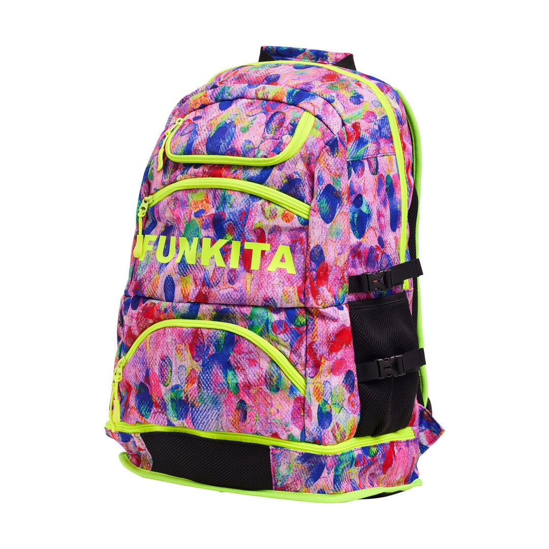 Side view of a multicolored floral pattern Funkita backpack with bright accents and multiple compartments, featuring padded shoulder straps and drink bottle holder.