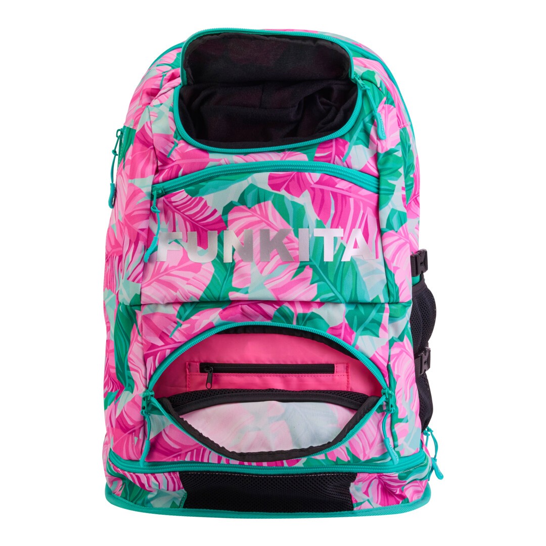 Front view of the pink and green tropic patterned Funkita Tropic Palm Elite Backpack showing multiple open compartments and padded shoulder straps.