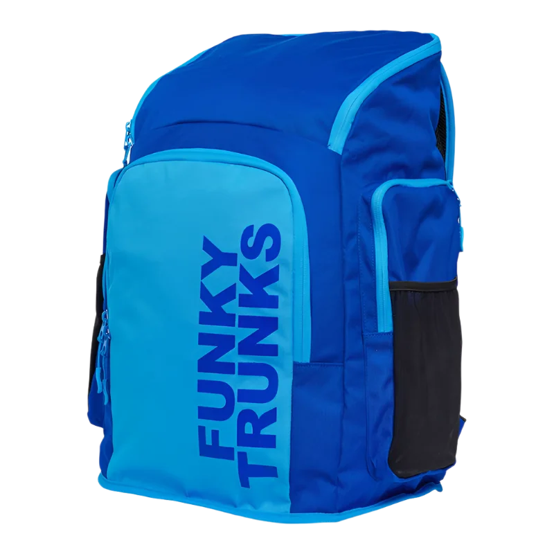 Blue backpack with 'Funky Trunks' branding on an angled view