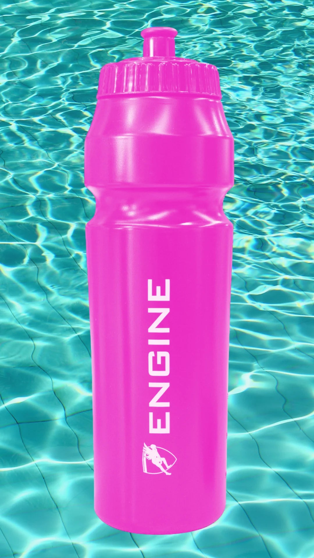 Pink water bottle with 'ENGINE' branding on a turquoise water background