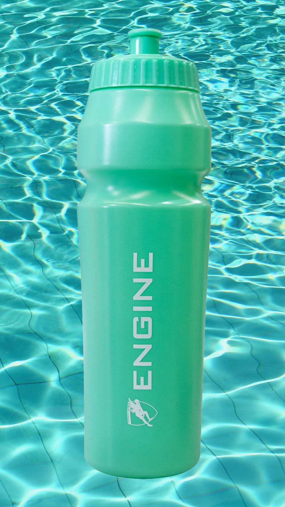 Turqua water bottle with 'ENGINE' branding on a pool background