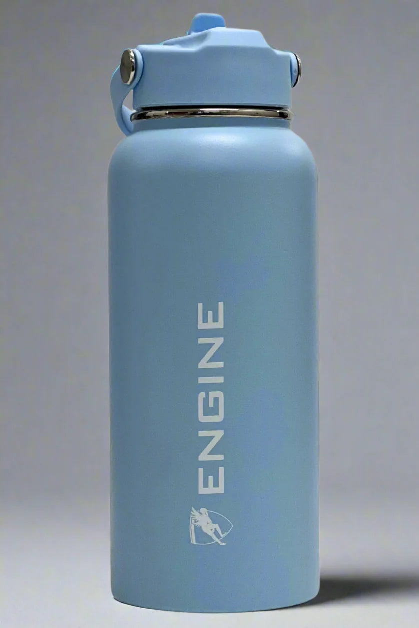 A sky blue coloured insulated water bottle with a matching lid and carrying loop, featuring the word 'ENGINE' printed vertically in white.