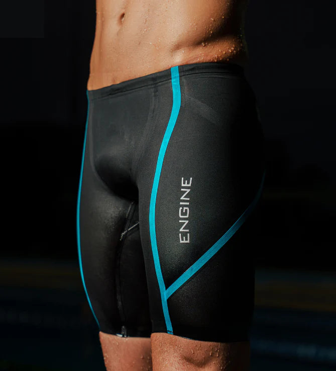 Black racing jammers with blue accents and 'Engine' branding on a dark background