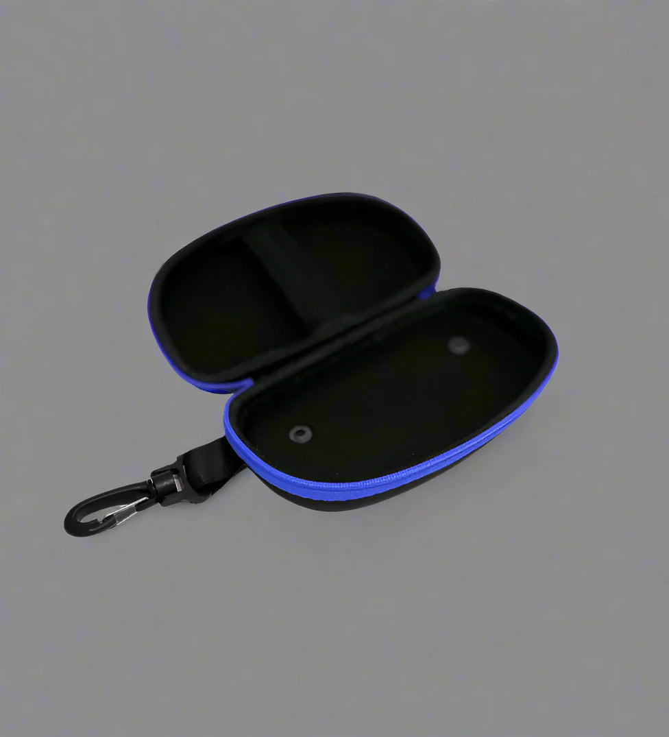 Open view of black goggle case with 'ENGINE' branding on and blue trim