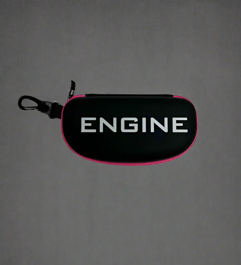 Swim goggle case, "ENGINE" branding, black with pink trim, zipper closure, clip for attachment.