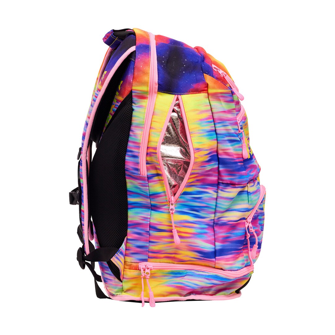 Side view of the a multicoloured sunset print Funkita Darkinjung Sunset Backpack showing multiple compartments and padded shoulder straps.