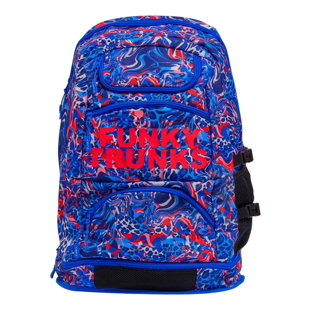 Blue and red patterned swimming backpack with 'Funky Trunks' branding
