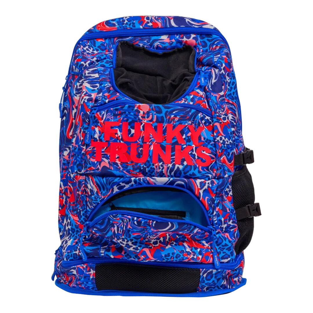 Blue and red patterned swimming backpack with 'Funky Trunks' branding with pockets opened