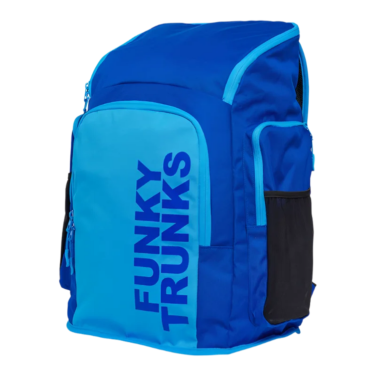 Blue backpack with 'Funky Trunks' branding on an angled view