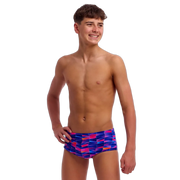 Young man wearing colourful swim trunks from 'Funky Trunks'