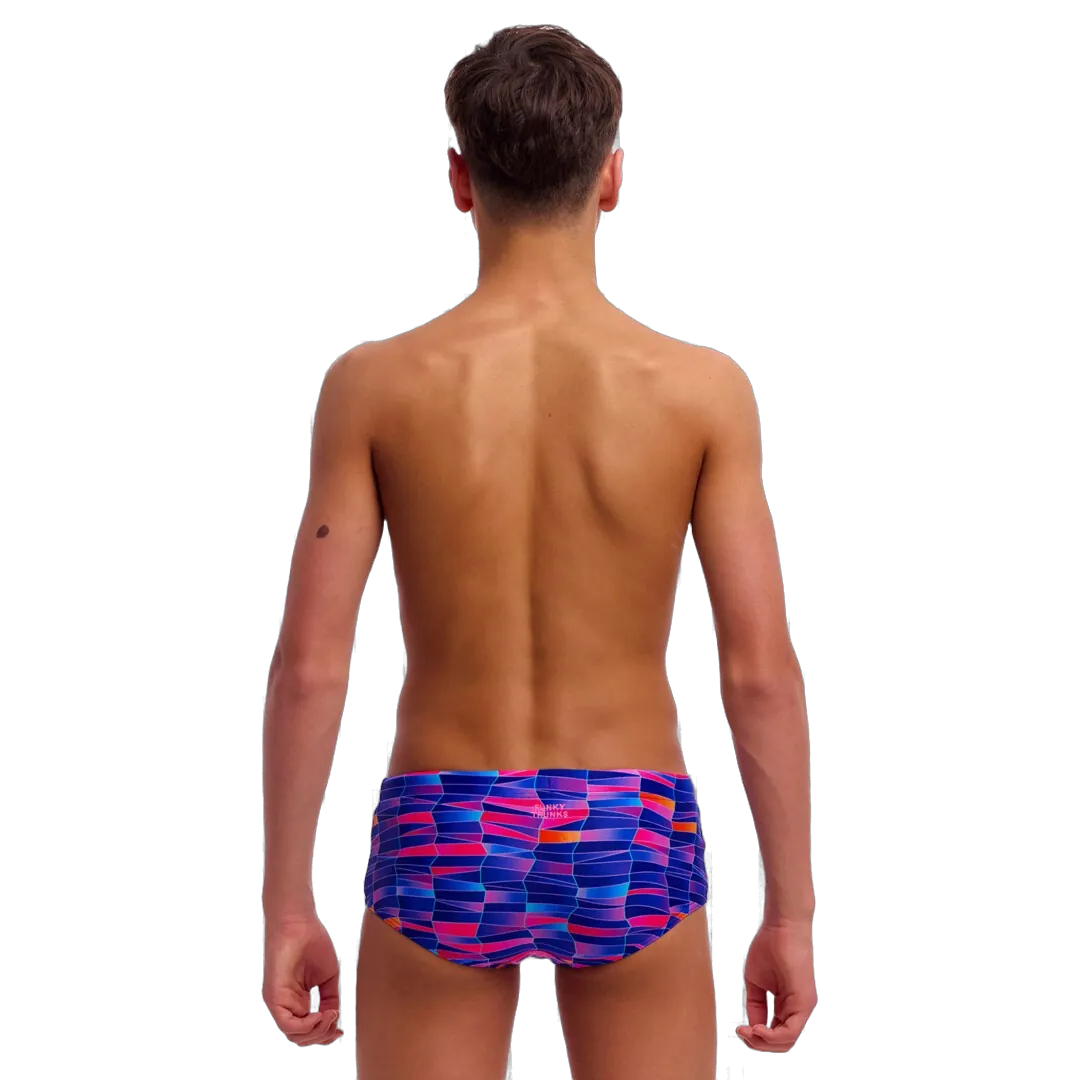 Young man wearing colourful swim trunks from 'Funky Trunks'