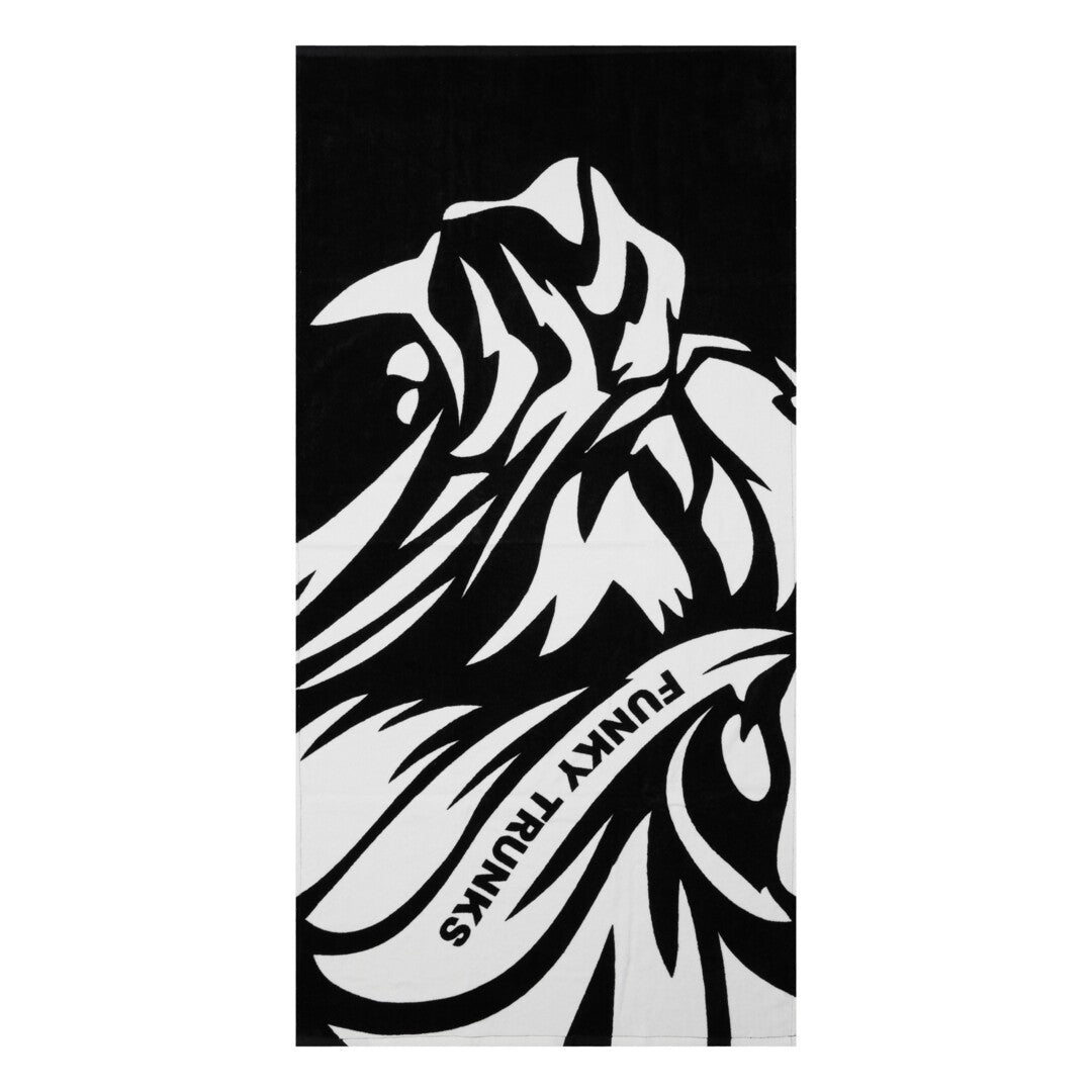 Black and white patterned towel with a roaring  lion face and 'Funky Trunks' branding on a white background