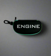 Black goggle case with 'ENGINE' branding on and turquoise trim
