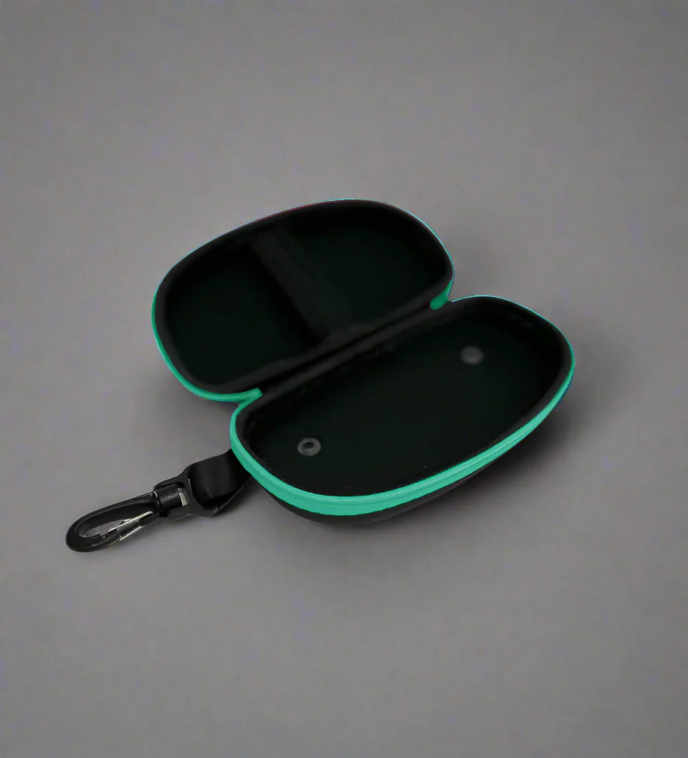 Open black goggle case with 'ENGINE' branding on and turquoise trim